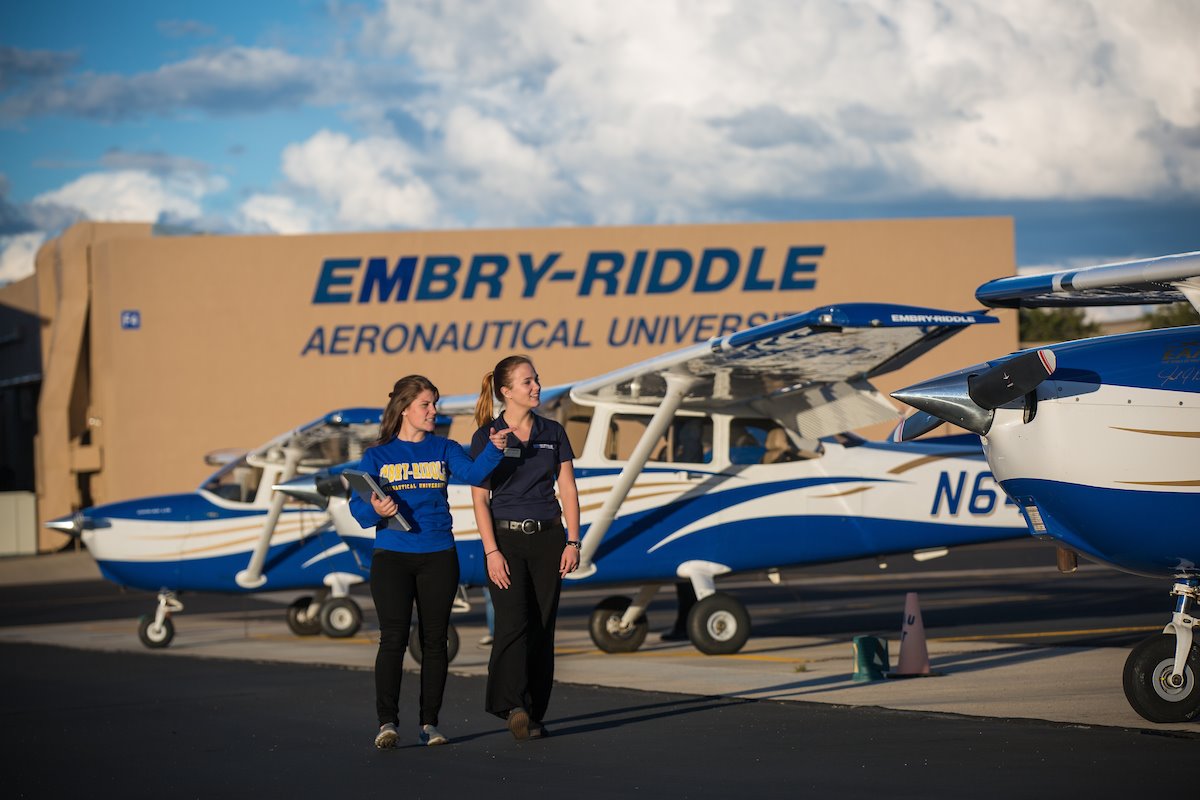 2 students around ERAU planes