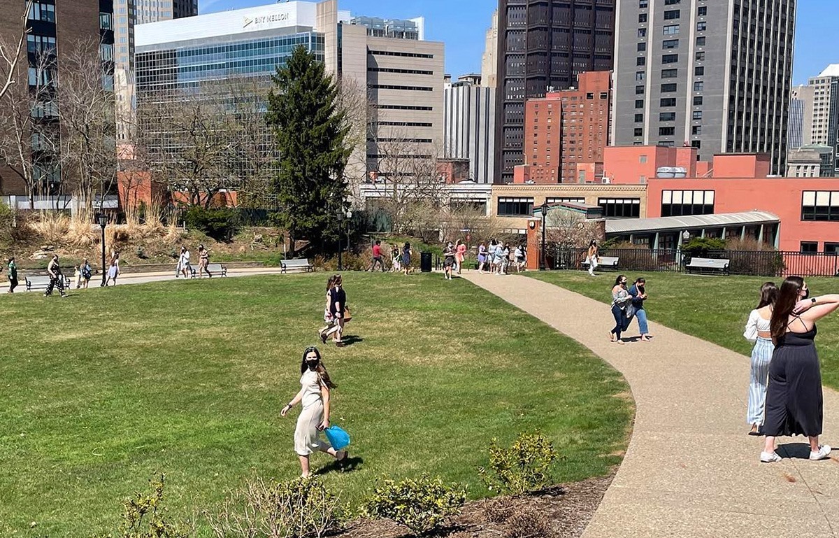 Duquesne campus and students in masks